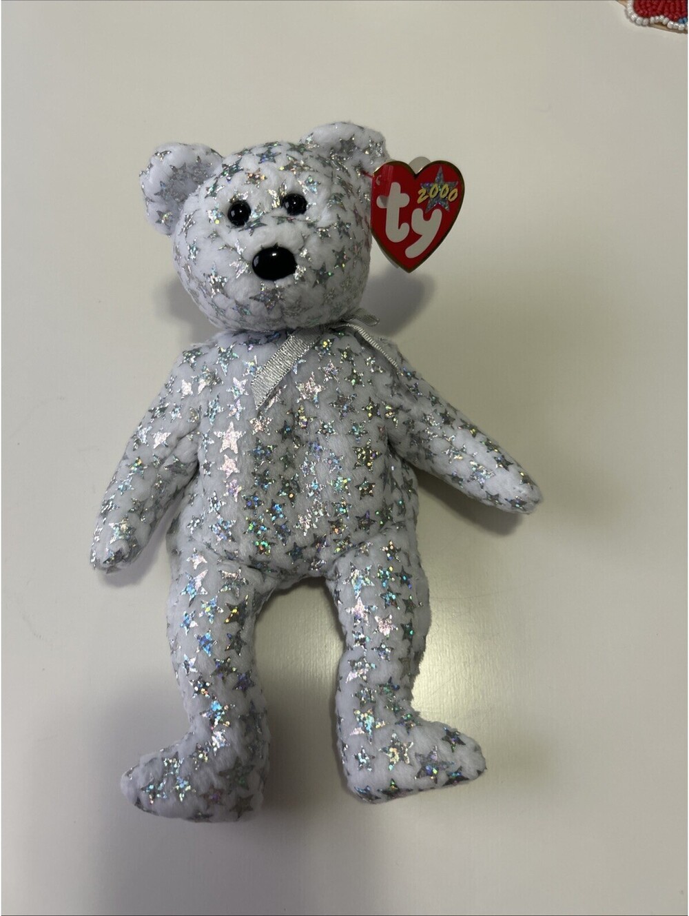 TY Beanie THE BEGINNING BEAR. White With Silver Stars And Ribbon. Jan 1 2000 NWT